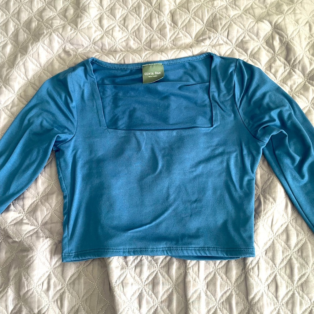 Long sleeve crop top. Square neck line. Very good fabric